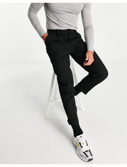 River Island pleated regular fit tapered twill pants in black