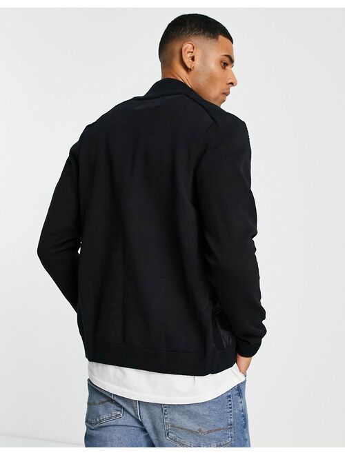 Jack & Jones Core padded jacket with knitted sleeves in black