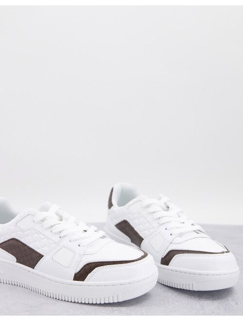 River Island low top monogrammed sneakers in white