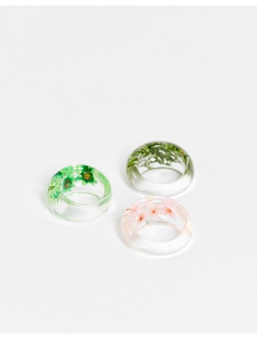 ASOS DESIGN pack of 3 rings with trapped flowers in clear plastic