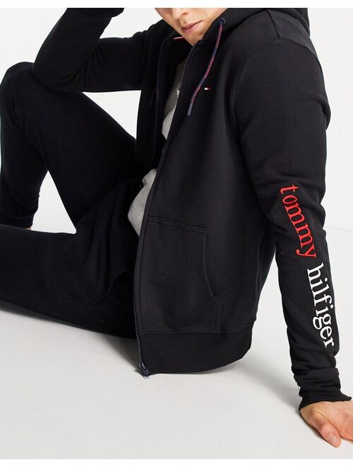 Tommy Hilfiger lounge hoodie with front remix logo in black - Exclusive to ASOS