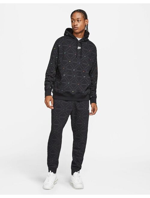 Nike Branded AOP Pack all over logo hoodie in black/multi