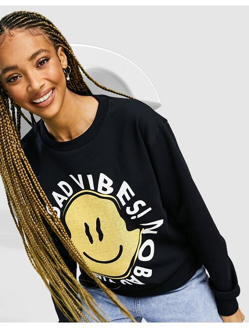 Asos Design oversized sweatshirt with happy vibes print in black