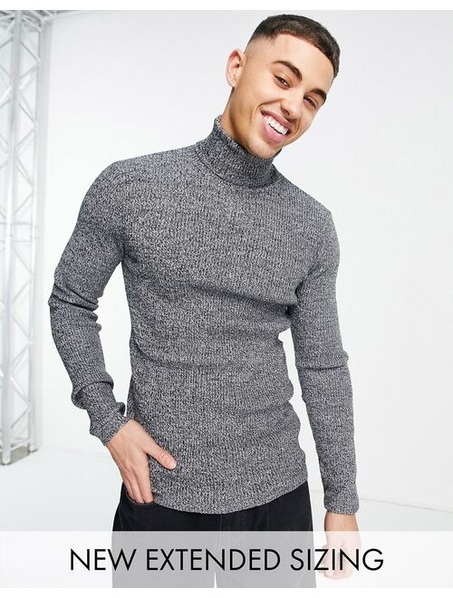 Asos Design muscle fit ribbed rollneck sweater in black and white twist