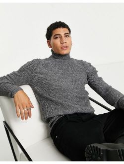muscle fit ribbed rollneck sweater in black and white twist