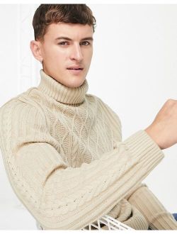 cable knit roll neck sweater in beige