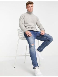 lambswool roll neck sweater in light gray