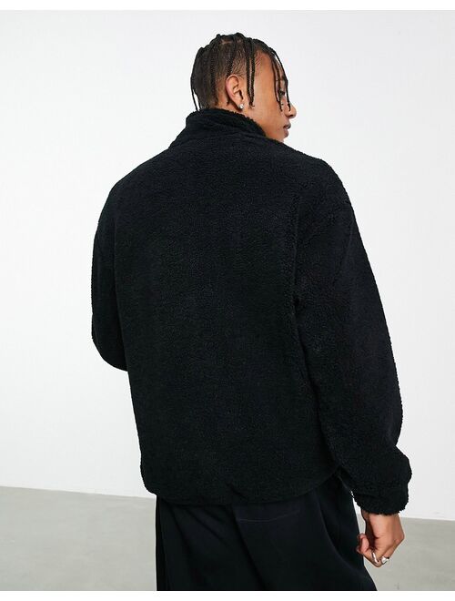 Bershka oversized half zip sweater in black teddy borg