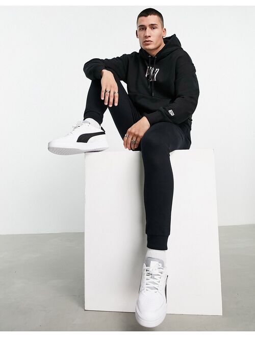Puma Downtown oversized hoodie in black and pink - exclusive to ASOS