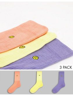 happy face embroidered crew socks in pastel tones