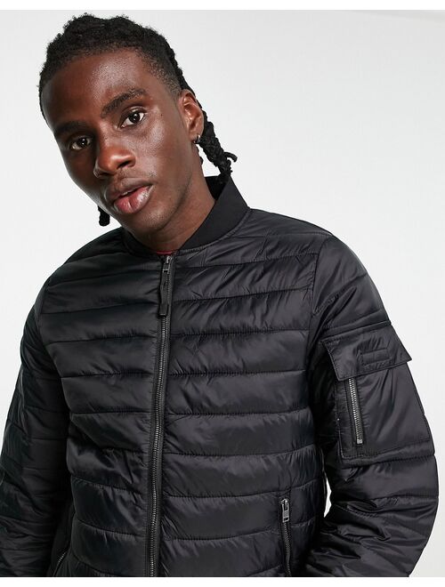 Bershka quilted puffer in black
