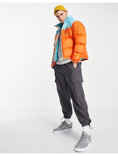 The North Face 1996 Retro Nuptse jacket in orange