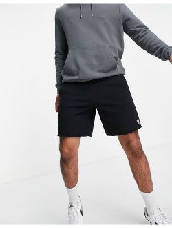 shorts in black with small logo