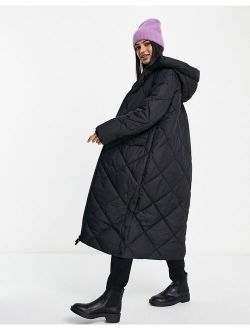 quilted longline puffer coat in black