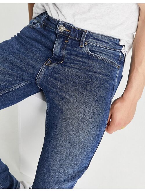 New Look skinny jeans in mid blue