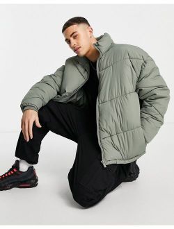 funnel neck puffer with chevron print in khaki