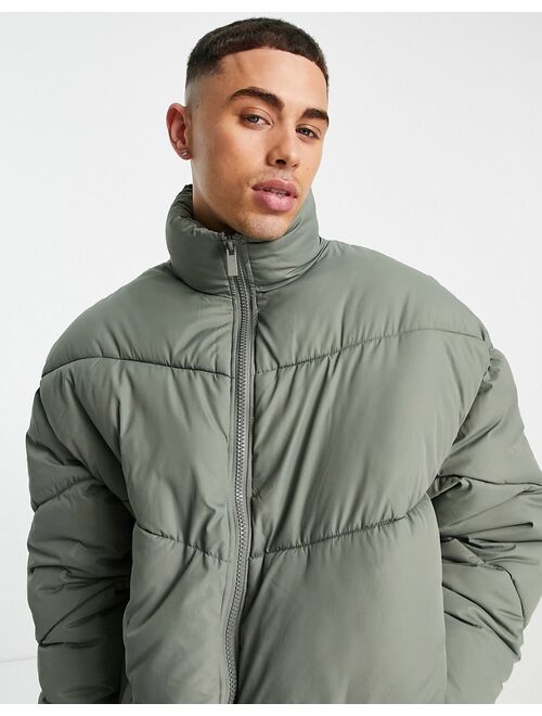 New Look funnel neck puffer with chevron print in khaki