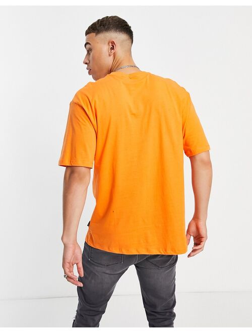 Only & Sons oversized T-shirt with Chicago print in orange Exclusive to ASOS