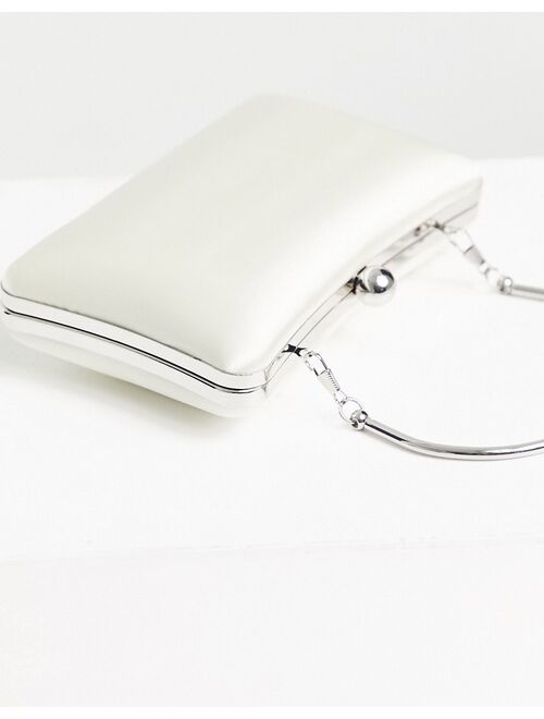 True Decadence Exclusive structured clutch bag with metal top handle in off white