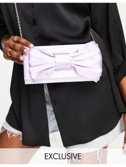 Exclusive foldover clutch bag with bow detail in lilac