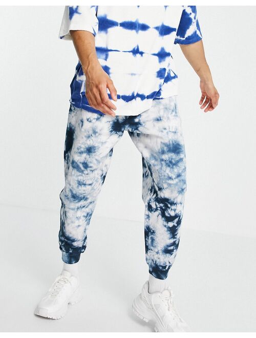 Asos Design oversized sweatpants in blue tie dye
