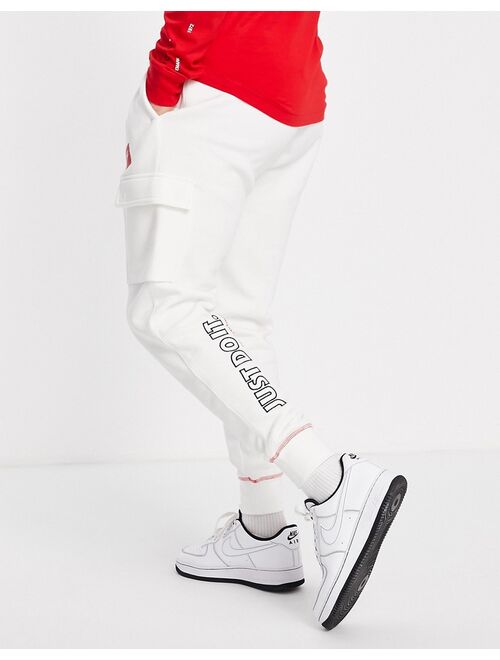 Nike Just Do It cuffed cargo fleece jogger sweatpants in white