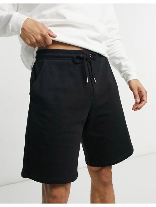 Asos Design oversized jersey shorts in black