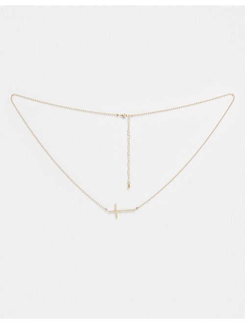 ASOS DESIGN belly chain with cross charm in gold tone