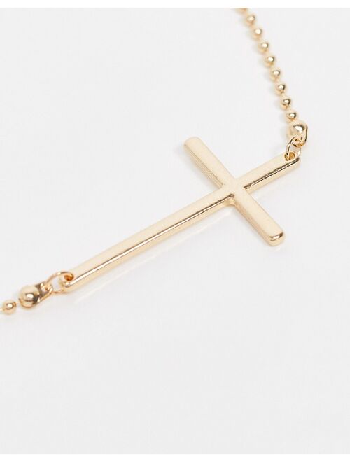 ASOS DESIGN belly chain with cross charm in gold tone