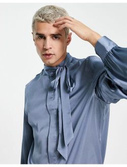 satin shirt with tie neck and blouson volume sleeve in blue
