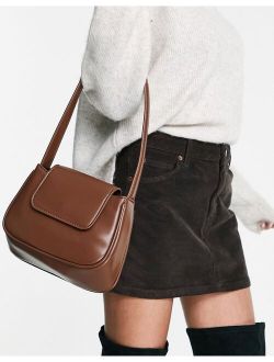 curved shoulder bag with flap in chocolate
