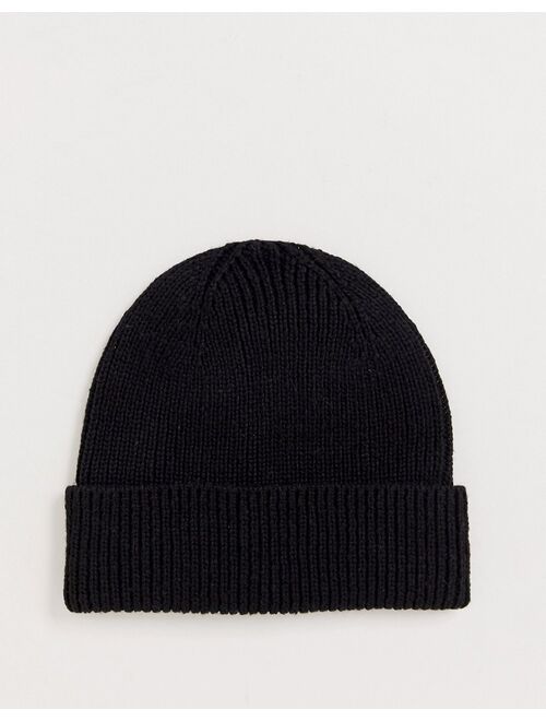 Asos Design fisherman rib beanie hat in recycled polyester in black