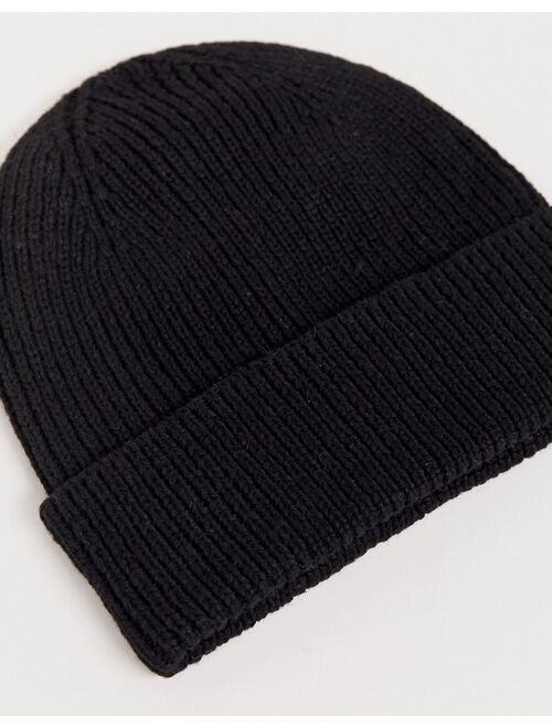 Asos Design fisherman rib beanie hat in recycled polyester in black