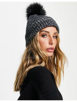 mixed knit pom beanie in black and white
