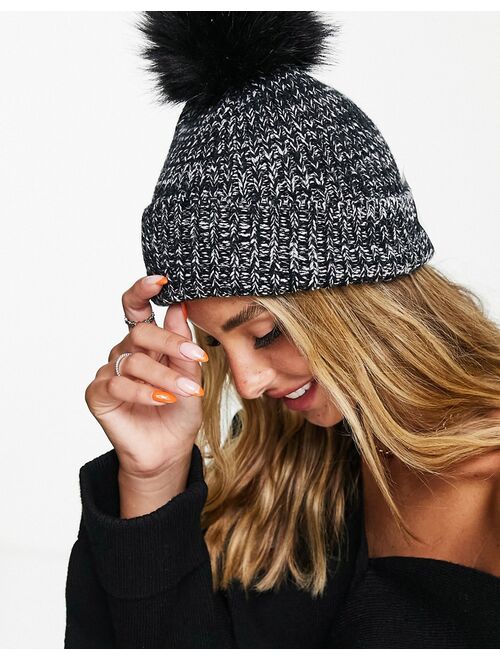 Asos Design mixed knit pom beanie in black and white