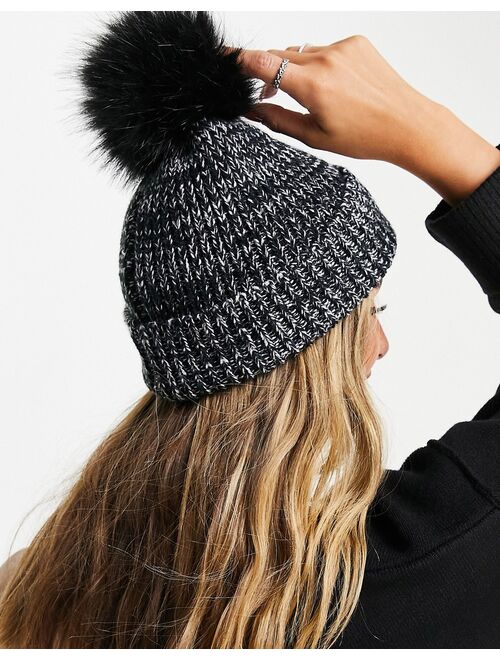 Asos Design mixed knit pom beanie in black and white