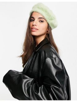 fluffy knitted beret in green