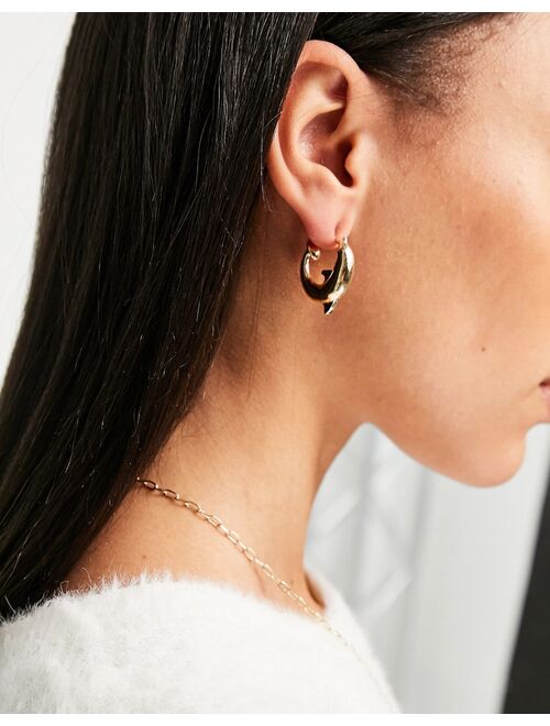 Asos Design hoop earrings in dolphin design in gold tone