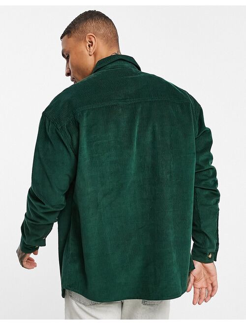 Asos Design 90s oversized cord shirt with double pockets in forest green