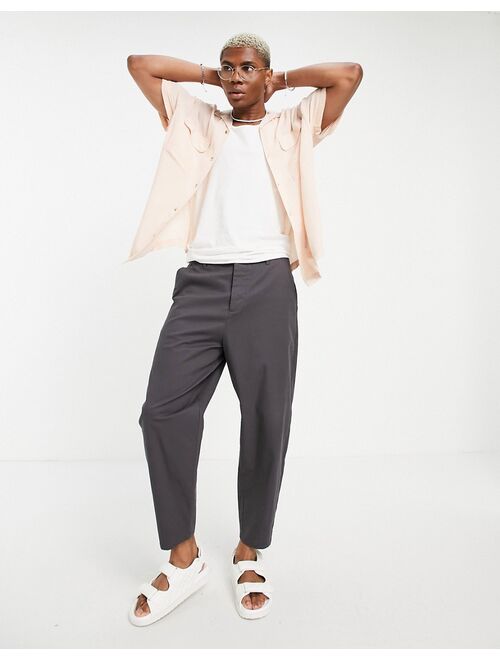 Asos Design crinkle viscose shirt with revere collar and pockets in pink
