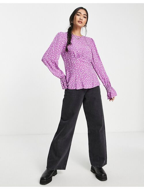 River Island puff sleeve blouse in purple spot print