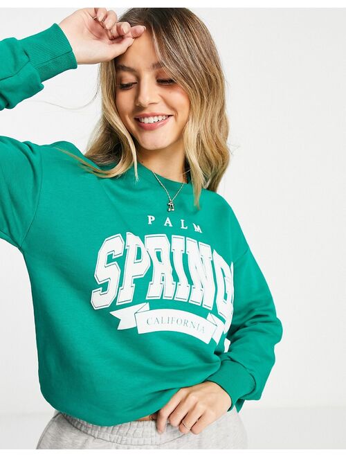 Stradivarius Palm Springs print sweatshirt in green