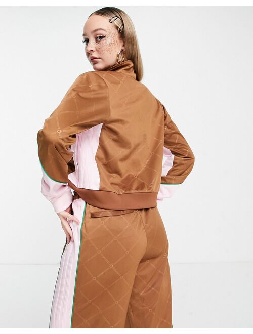 Adidas Originals Originals 'Retro Luxury' track jacket in brown and pink with monogram print