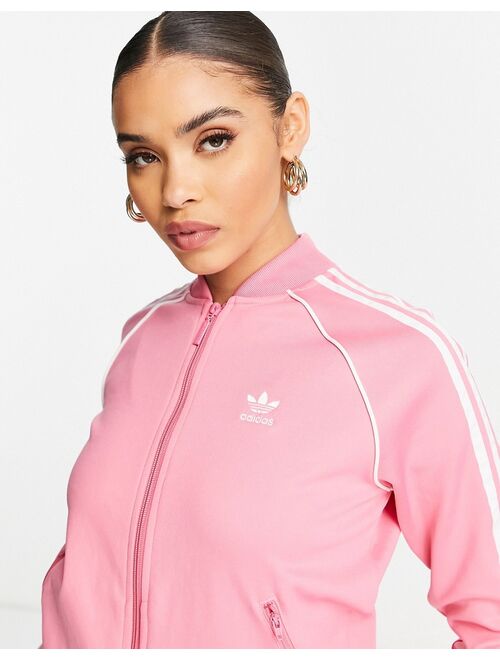 Adidas Originals Originals adicolor three stripe track top in pink