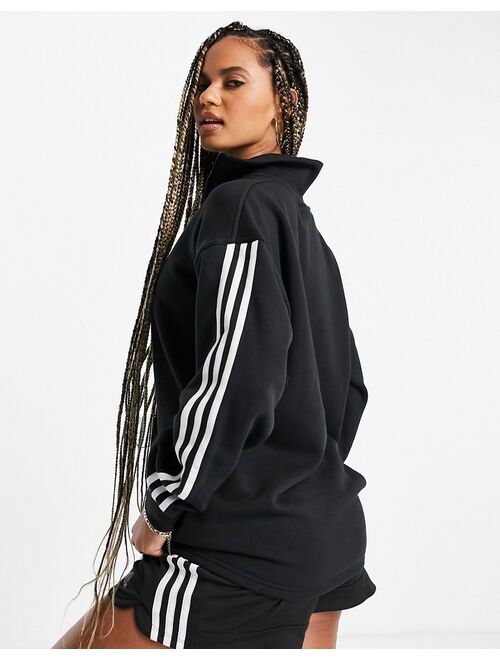 Adidas Originals adicolor three stripe quarter zip sweatshirt in black