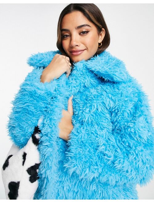 Monki faux fur jacket in bright blue