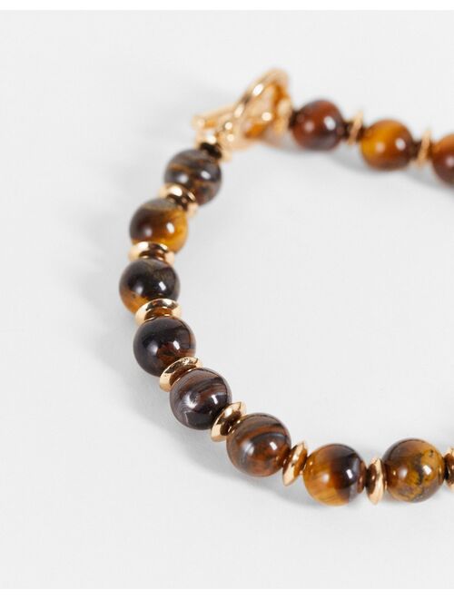 Asos Design beaded bracelet with tigers eye stones and t-bar in brown