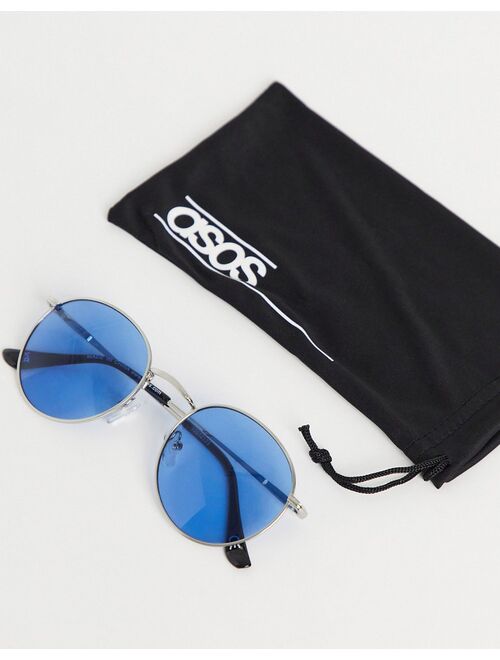 Asos Design round sunglasses in silver metal with blue lens