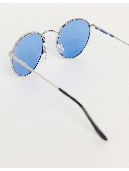 Asos Design round sunglasses in silver metal with blue lens
