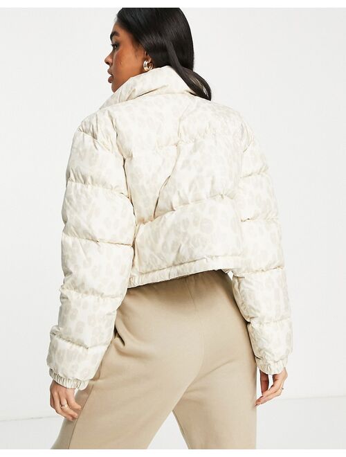 The North Face Nuptse cropped leopard print jacket in white